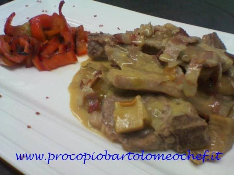 Immagine articolo: Costolette di agnello con porcini e pancetta croccante e peperoni grigliati Immagine articolo: Costolette di agnello con porcini e pancetta croccante e peperoni grigliati